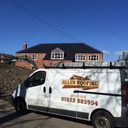 Allen Roofing van outside a completed roof – emergency roof repairs Lincoln