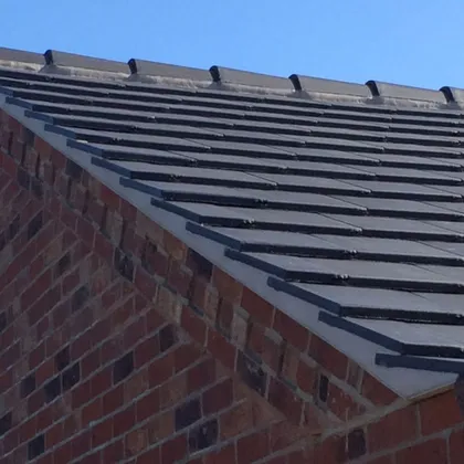 Neat verge detail on a newly tiled roof in Lincoln