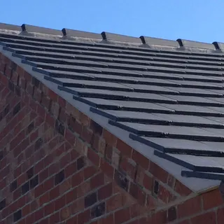 Neat verge detail on a newly tiled roof in Lincoln