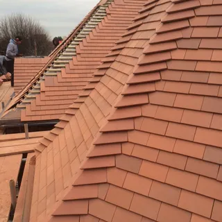 Clay tiled hip on a new roof in Lincolnshire