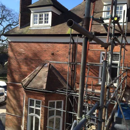 Scaffolding around a turret roof during re-roofing in Lincoln