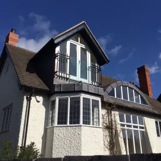 Period house with lead dormer and balcony roofed by roofers in Lincoln