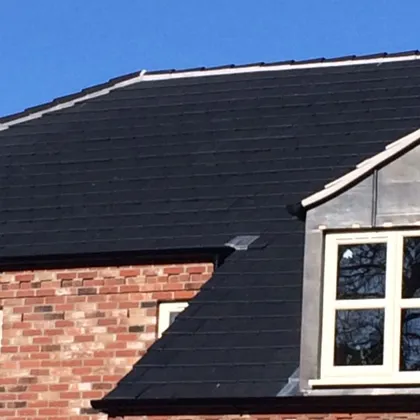 Slate roof with lead-clad dormer window – slate roofing Lincoln